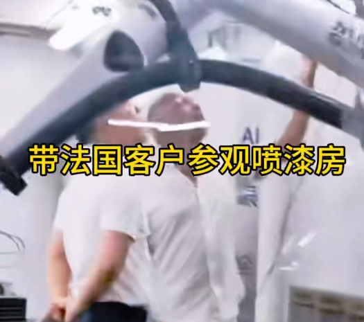 Show the French client around the paint booth